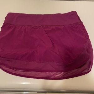 Purple Lululemon tennis skirt with shorts